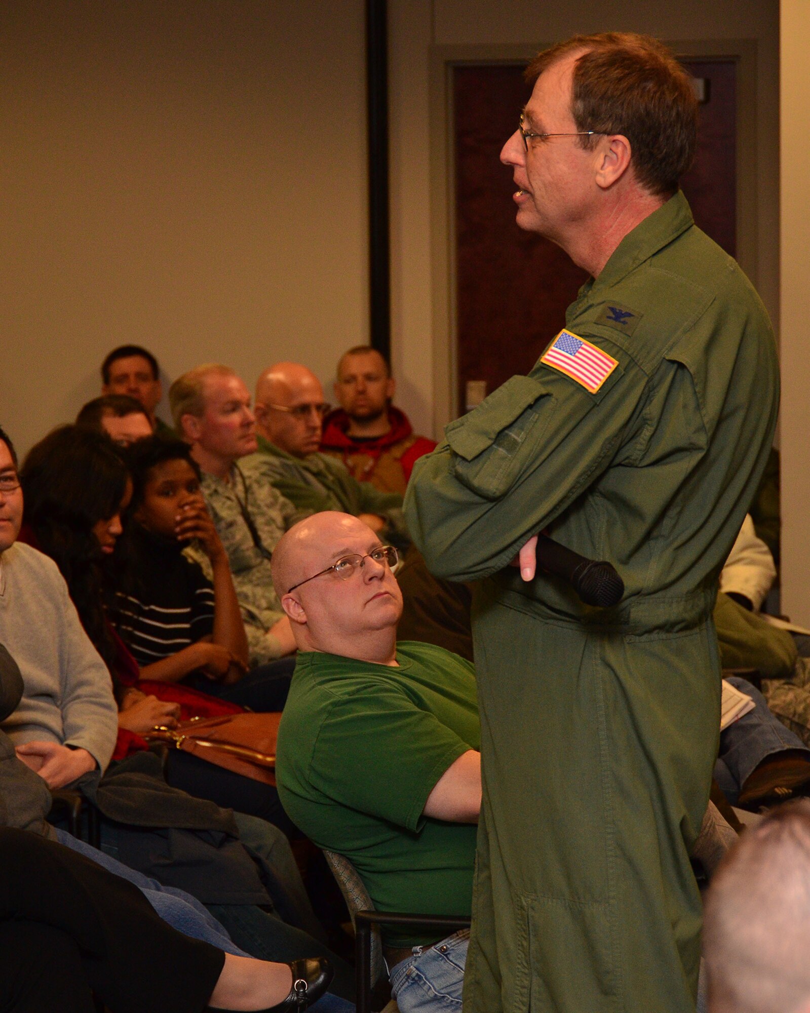 WRIGHT-PATTERSON AIR FORCE BASE, Ohio - Col. Stephen Goeman, 445th Airlift Wing commander, speaks to more than 200 445th AW air reserve technicians and civilians March 26 about the anticipation of possible furloughs and the potential actions if sequestration goes into effect next month. (U.S. Air Force photo/Staff Sgt. Mikhail Berlin)