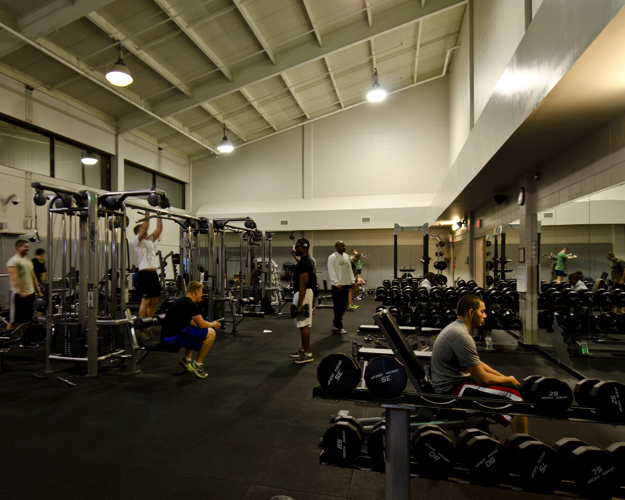 Patrons work out at the Aderholt Fitness Center at Hurlburt Field, Fla., March, 27, 2013. The Aderholt will test a new 24-hour manning schedule for a 30-day trial period beginning April 1. (U.S. Air Force Photo/Staff Sgt. John Bainter)