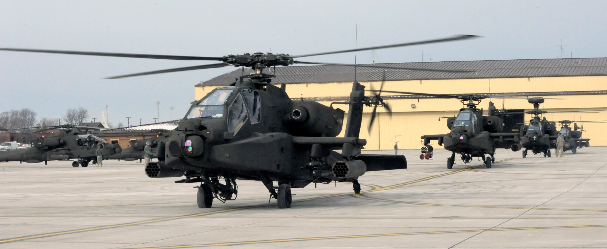 U.S. Army AH-64 Apache Longbows pilots from the 1-135th Attack Reconnaissance Battalion at Whiteman Air Force Base, Mo., prepare March 27, 2013, for their deployment to Afghanistan. The Apaches carry three weapons systems, including a state-of-the-art Hellfire missile that can be laser-guided or radar-guided. (U.S. Air Force photo by Airman 1st Class Shelby R. Orozco/Released)