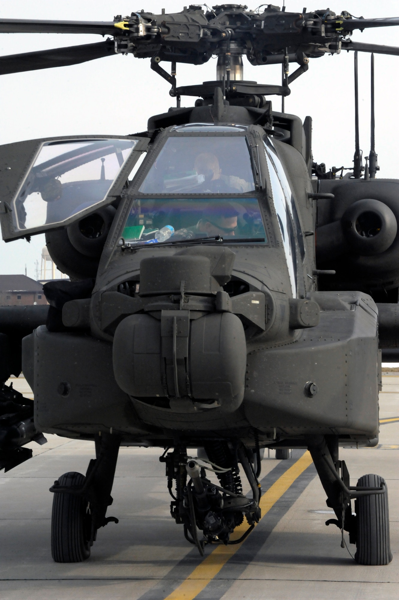 U.S. Army AH-64 Apache Longbow pilots from the 1-135th Attack Reconnaissance Battalion at Whiteman Air Force Base, Mo., prepare March 27, 2013, for their deployment to Afghanistan. The Apache Longbow is the most modernized attack helicopter in the world. (U.S. Air Force photo by Airman 1st Class Shelby R. Orozco/Released)