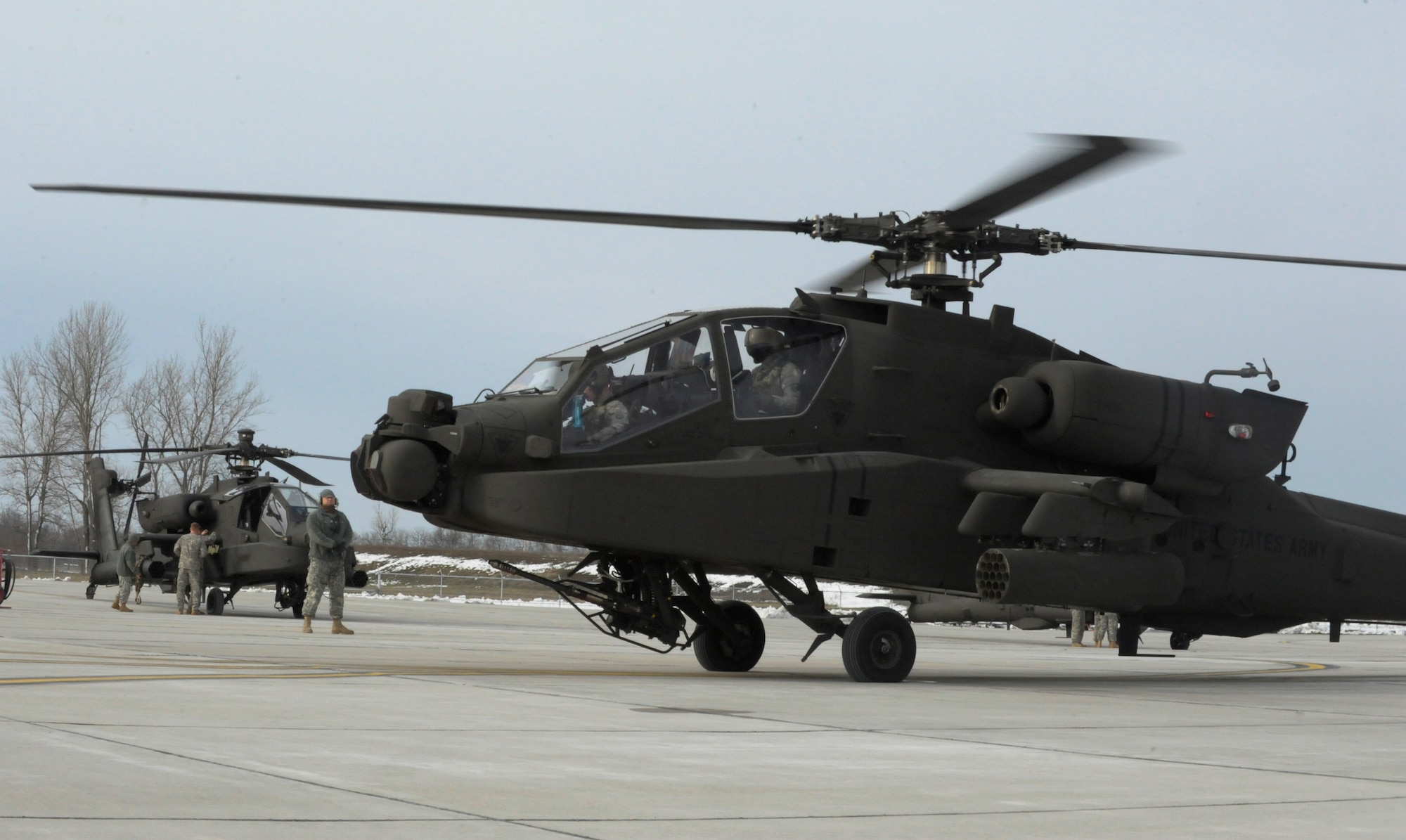 U.S. Army AH-64 Apache Longbows and pilots from the 1-135th Attack Reconnaissance Battalion at Whiteman Air Force Base, Mo., prepare March 27, 2013, for their deployment to Afghanistan. The Apaches first came to Whiteman AFB in 2002. (U.S. Air Force photo by Airman 1st Class Shelby R. Orozco/Released)
