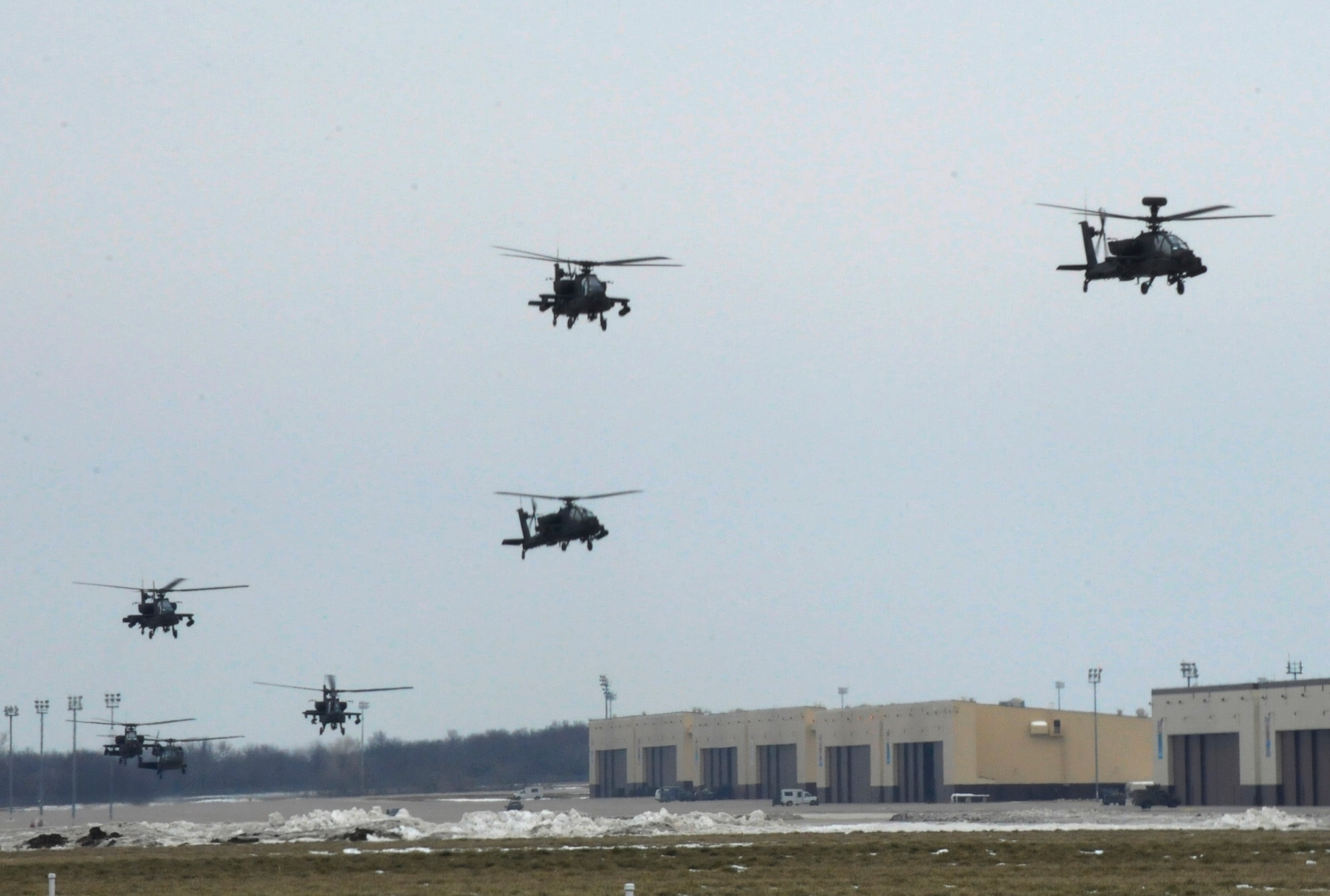 U.S. Army AH-64 Apache Longbows from the 1-135th Attack Reconnaissance Battalion at Whiteman Air Force Base, Mo., leave March 27, 2013, for their deployment to Afghanistan. More than 300 Soldiers from the 1-135th ARB deployed with the aircraft. (U.S. Air Force photo by Airman 1st Class Shelby R. Orozco/Released)