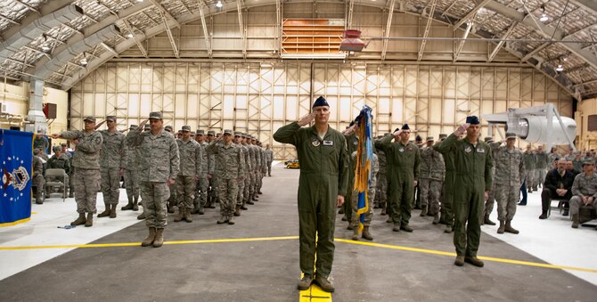 JOINT BASE ELMENDORF-RICHARDSON, Alaska -- Airmen of 3rd Wing salute the new incoming 3rd Wing commander, Col. David S. Nahom, during the unit’s change of command ceremony Wednesday at Hangar 1. Air Force Col. Dirk D. Smith relinquished command of the wing after serving as commander for 19 months. (US Air Force photos/Johnathon Green) 
