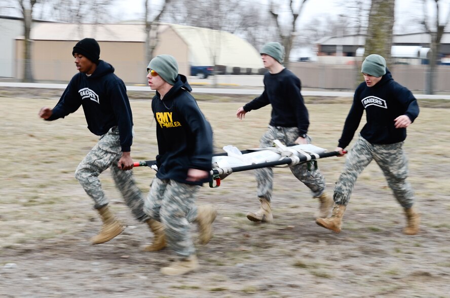 A team of Junior Reserve Officers’ Training Corps cadets sprint to the next obstacle course during the 7th annual Raider Challenge hosted by the 139th Airlift Wing at Rosecrans Air National Guard Base, St. Joseph, Mo., March 23, 2013. More than 150 JROTC cadets competed in the event. (Air National Guard photo by Tech. Sgt. Michael Crane)