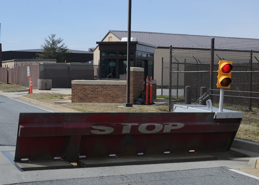 The active vehicle barrier system, or pop-up barrier, is designed to physically prevent unauthorized vehicles from entering Joint Base Andrews.  The pop-up barriers are hydraulic, manually operated, systems that deploy in just over one second.  As a safety feature, there are light systems immediately next to each barrier.  These lights flash yellow when the barriers are completely down.  When you see the flashing yellow light, proceed with caution at a reduced speed.  

If the light is red, stop immediately!  The steady red light means the pop-up barrier has been activated.  DO NOT PROCEED.  Wait until the light returns to a yellow flashing before proceeding.  

If stopped at a light, DO NOT STOP ON THE BARRIER SYSTEM.  These barriers deploy with enough force to lift your vehicle off the ground.  

Please contact the Antiterrorism Office at 240-612-6313 with any questions or for additional information.  We look forward to protecting you, while together we defend America.