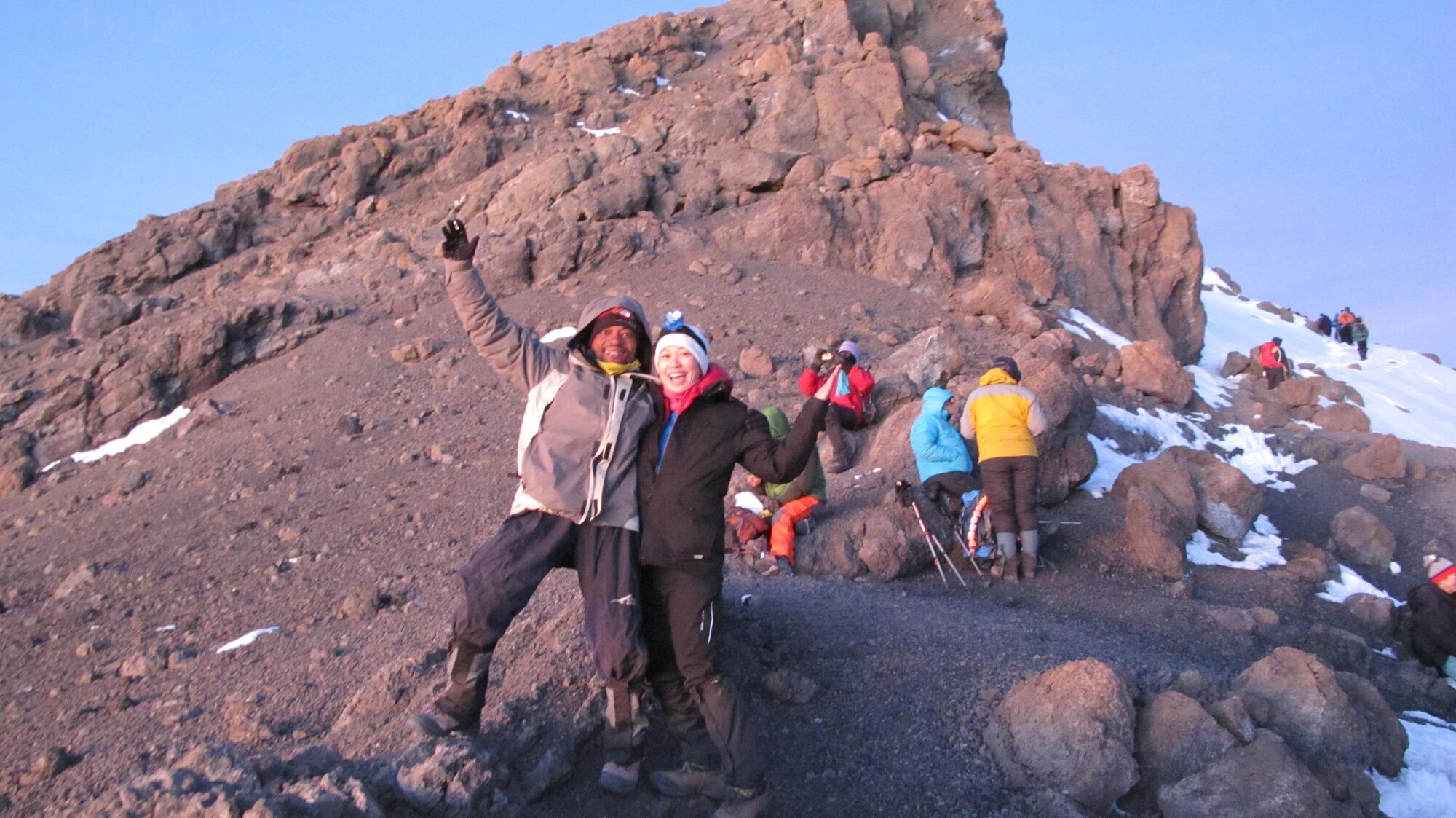 1st Lt. Diana Wong, center, assigned to the 509th Force Support Squadron at Whiteman Air Force Base, Mo., poses with her guide, Tom, after reaching the summit of Mount Kilimanjaro in Tanzania, Feb. 14, 2013. Wong said she made the journey to immerse herself in nature and escape the monotony of everyday life. (Courtesy photo/Released)