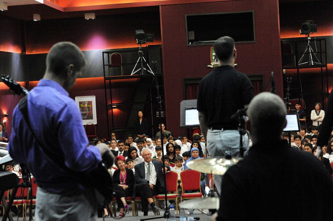 The U.S. Air Forces Central Command Band “Vector” performed for more than 250 students and teachers at a host nation school in Southwest Asia Mar 28, 2013. The AFCENT Band tours throughout the AOR to positively promote troop morale, diplomacy and outreach to host nation communities. (U.S. Air Force photo by Senior Master Sgt. George Thompson)