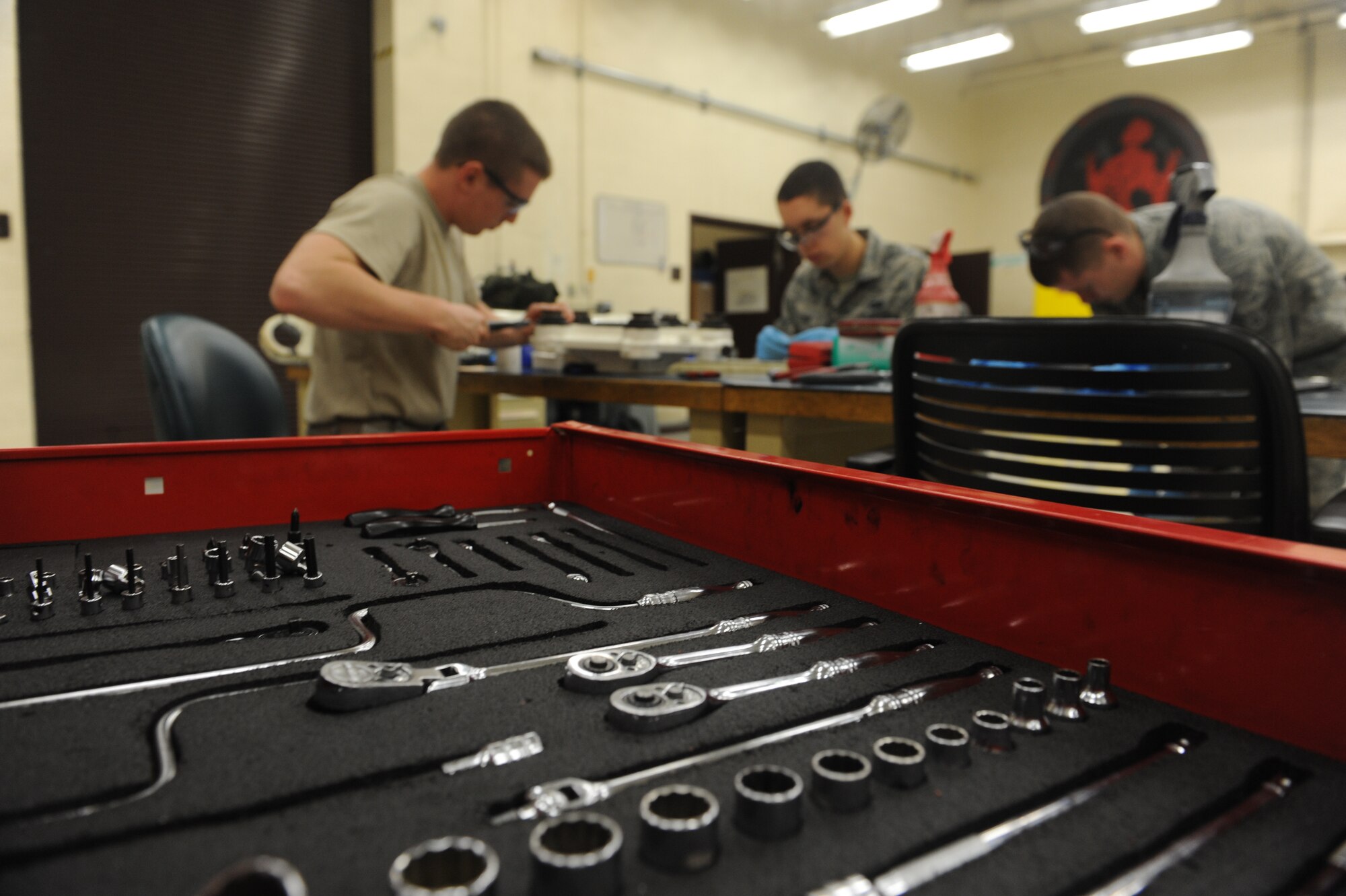 Senior Airmen Travis Dowler (left), Airman Trevor Alder, and Airman 1st Class J.C. Hutchins, 509th Maintenance Squadron hydraulic systems repair technicians, work together to complete a B-2 Spirit brake overhaul at Whiteman Air Force Base, Mo., March 22, 2013. The hydraulic shop maintains all hydraulic systems on the aircraft, including flight controls, landing gear and brakes.
(U.S. Air Force photo by Airman 1st Class Bryan Crane/Released)
