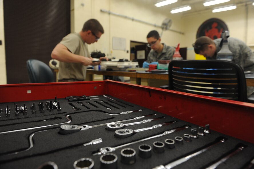 Senior Airmen Travis Dowler (left), Airman Trevor Alder, and Airman 1st Class J.C. Hutchins, 509th Maintenance Squadron hydraulic systems repair technicians, work together to complete a B-2 Spirit brake overhaul at Whiteman Air Force Base, Mo., March 22, 2013. The hydraulic shop maintains all hydraulic systems on the aircraft, including flight controls, landing gear and brakes.
(U.S. Air Force photo by Airman 1st Class Bryan Crane/Released)
