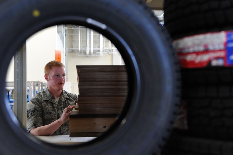U.S. Air Force Airman 1st Class Brian Cheever, 35th Civil Engineer Squadron Operations Management, inventories lumber in the 35 CES supply warehouse at Misawa Air Base, Japan, March 27, 2013. Cheever is one of four Airmen who manage and issue all inventory for approved in-house projects here. (U.S. Air Force photo/Senior Airman Derek VanHorn)