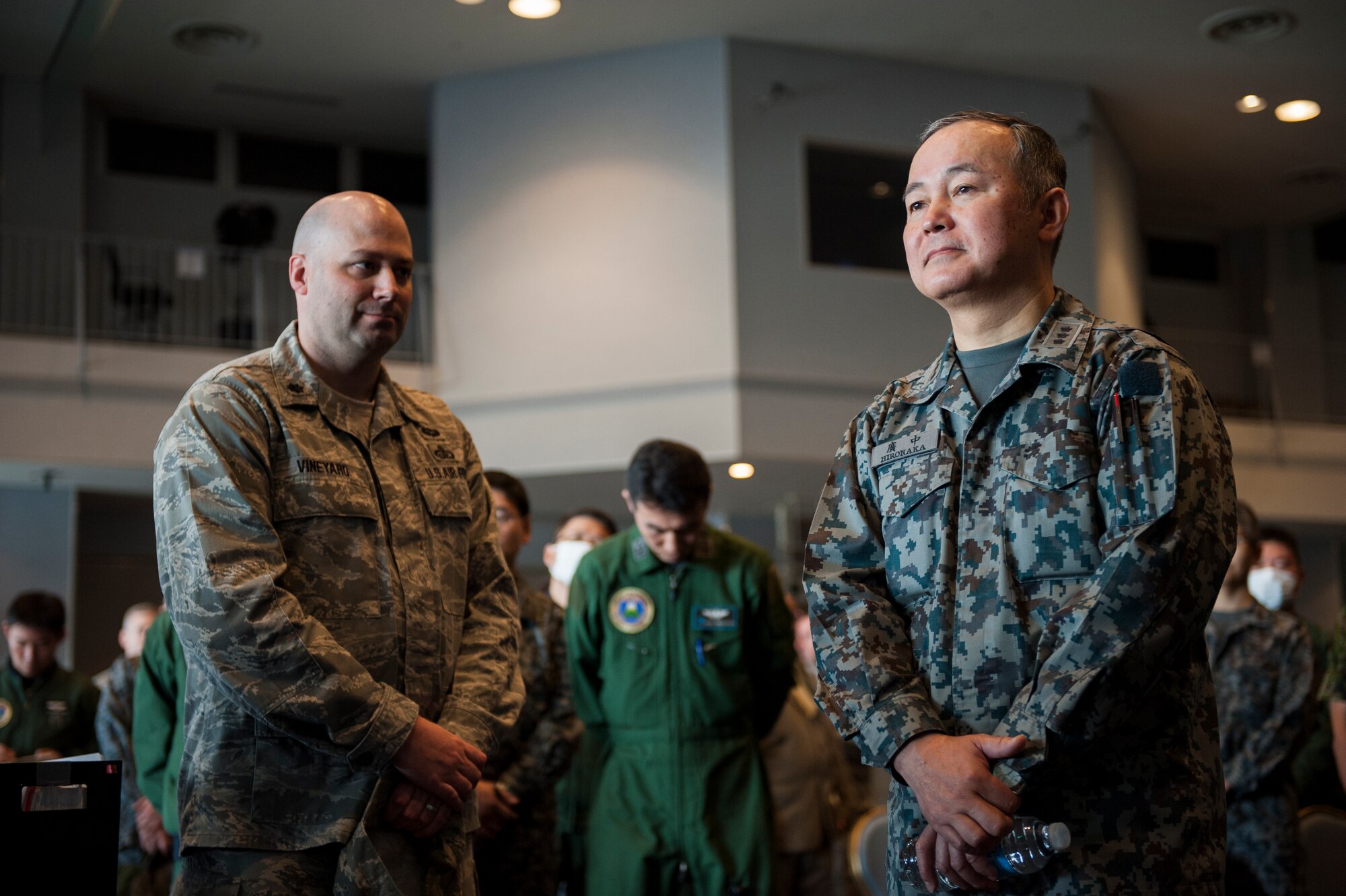 Japan Air Self-Defense Force Lt. Gen. Masayuki Hironaka, Air Support Command commander, observes a simulated noncombatant evacuation operation at the Taiyo Recreation Center at Yokota Air Base, Japan, March 28, 2013.  Yokota service members showcased their NEO capabilities in an effort to strengthen bilateral relations with JASDF counterparts.  (U.S. Air Force photo by Senior Airman Cody H. Ramirez) 