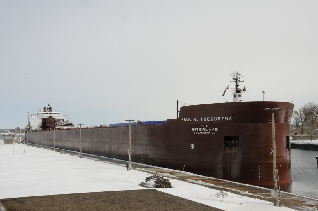 The largest vessel on the Great Lakes, the 1014 foot-long Paul R. Tregurtha waits on the pier below the Poe Lock March 24.  The Soo Locks navigation season traditionally begins at 12:01 a.m. March 25.