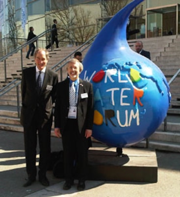 Photo of IWR Director Bob Pietrowsky (right) at the World Water Forum with Hans Van der Werf (left) of the Central Commission for Navigation on the Rhine.
