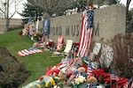 A makeshift memorial is set up in front of the Ford Museum in Grand Rapids, Mich.
