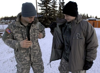 Army Sgt. Seth Paul (left) and his wife, Sgt. Katja Paul, both military police officers with the Alaska Army Guard's 49th Missile Defense Battalion at Fort Greely, call the Army's new Generation III Extended Cold Weather Clothing System the perfect answer to extreme conditions they face in Alaska.