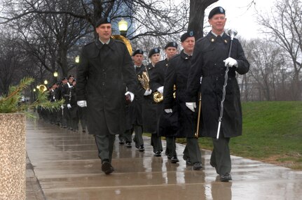 Soldiers of the Michigan Army National Guard's 126th Army Band march to their position during a practice session for former President Gerald Ford's funeral in Grand Rapids, Mich., Dec. 31, 2006. The funeral will be held Jan. 3, 2007.