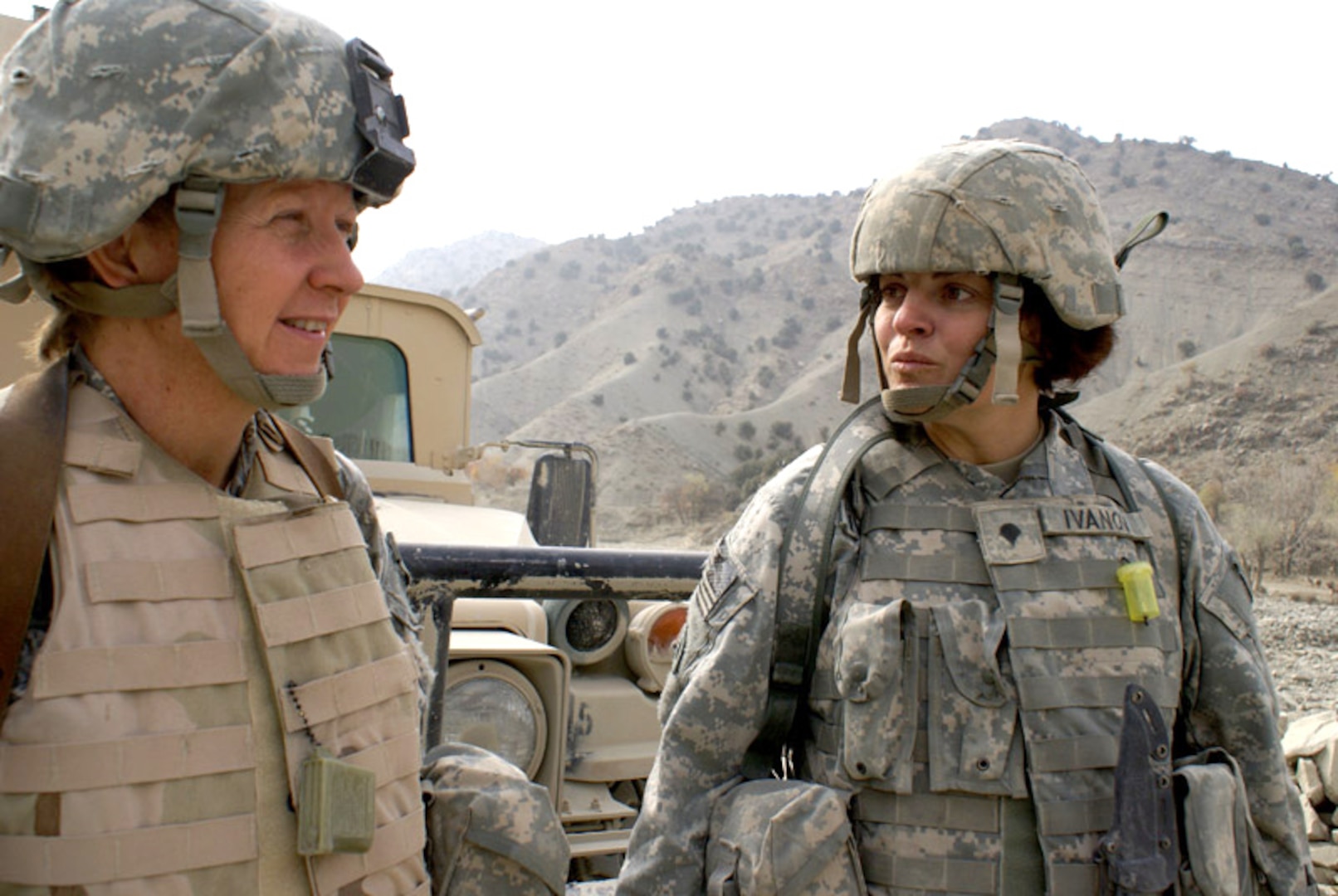 Oregon Army National Guard Staff Sgt. Jo Turner (left) and Spc. Cheryl Ivanov are battle buddies who stick together and help each other cope with the emotional and mental stress of combat operations in Afghanistan.