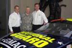 Casey Mears, the National Guard's new Guard Car Driver, poses with Lt. Gen. Clyde A. Vaughn, the director of the Army National Guard, and Lance McGrew, crew chief, at the Army National Guard Readiness Center, Arlington Hall, on Jan. 12, 2007. Mears will drive the new #25 National Guard GMAC Chevy Monte Carlo SS with Hendrick Motorsports in this year's NASCAR Nextel Cup series.