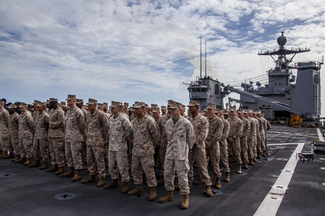 More than 100 Marines with 26th Marine Expeditionary Unit (MEU) participate in the 2013 Sexual Assault Awareness Month ceremony aboard the USS Carter Hall (LSD 50) while at sea March 28, 2013. The crew of the Carter Hall organized the event, which included signing a pledge board and a walk around the flight deck to express each service member’s commitment to the cause. The 26th MEU is currently deployed to the 6th Fleet area of operation. The MEU operates continuously across the globe, providing the president and unified combatant commanders with a forward-deployed, sea-based quick reaction force. The MEU is a Marine Air-Ground Task Force capable of conducting amphibious operations, crisis response, and limited contingency operations.
(U.S. Marine Corps photo by Staff Sgt. Edward Guevara/Released)