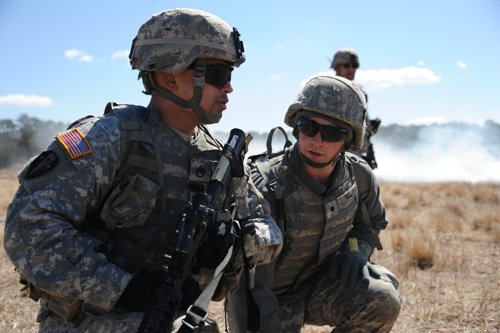 Cadet Christopher Hill (right), Derxel University ROTC student, acts as the platoon leader and provides guidance to New Jersey National Guard Staff Sgt. Erick Recinos, 2nd Battalion, 113th Infantry Regiment, squad leader, during squad live-fire training on Range 61 March 23, 2013, at Joint Base McGuire-Dix-Lakehurst, N.J. Hill evaluated Recinos’ situation reports evaluated his squad’s maneuver. The unit is based out of Riverdale, N.J. (U.S. Air Force photo by 2nd Lt. David J. Murphy/Released)