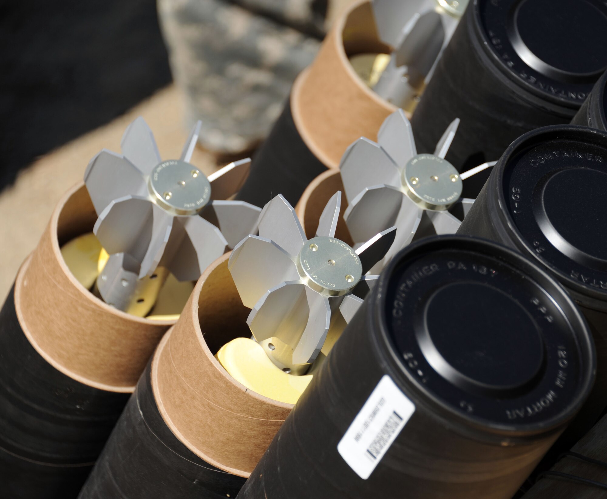 Mortar rounds sit ready to be used during mortar firing training on Mortar Firing Point 4 March 23, 2013, at Joint Base McGuire-Dix-Lakehurst, N.J. Mortar firing training was just one element of the New Jersey National Guard’s 2nd Battalion, 113th Infantry Regiment, training while at the joint base ranges. The brigade also took part in squad live-fire training and rifle qualification. The unit is based out of Riverdale, N.J. (U.S. Air Force photo by 2nd Lt. David J. Murphy/Released)