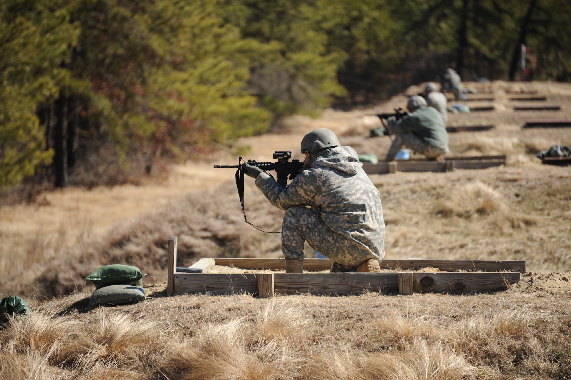 New Jersey National Guard Staff Sgt. David Pereda, 2nd Battalion, 113 Infantry Regiment, sniper-section leader, qualifies with an M4 rifle on Range 38 March 23, 2013, at Joint Base McGuire-Dix-Lakehurst, N.J. Pereda, a Blairstown, N.J., native, who returned from Afghanistan about a year ago, has to qualify with an M4 rifle annually. The unit is based out of Riverdale, N.J. (U.S. Air Force photo by 2nd Lt. David J. Murphy/Released)