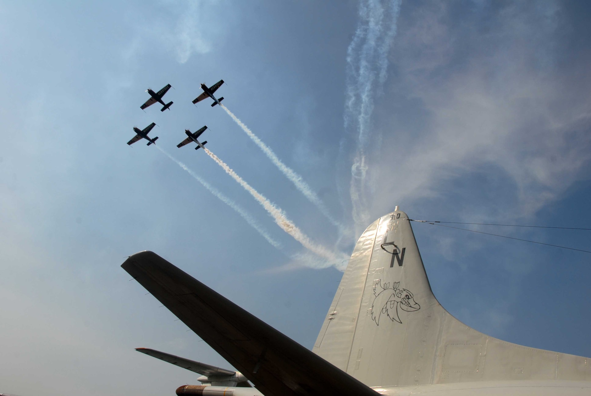 Aircraft from the Royal Malaysian Air Force perform high-speed aerial maneuvers during the 2013 Langkawi International Maritime and Aerospace Exhibition (LIMA 13) March 28, 2013 at Langkawi, Malaysia. Aircraft and joint personnel from the U.S. Air Force and U.S. Navy are supporting the 4-day exhibition and aerial demonstrations March 26-30. Events such as LIMA 13 help contribute to increased understanding and interoperability which supports region stability and security throughout the Indo-Asia-Pacific Region. (U.S. Navy photo/Mass Communication Specialist 1st Class Alfredo Rosado)