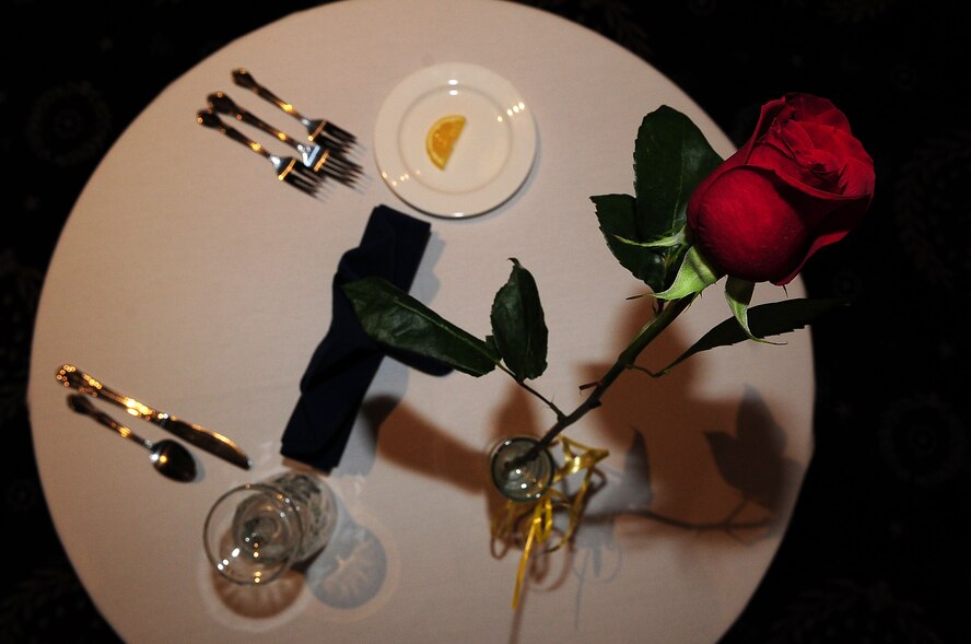 The Prisoner of War and Missing in Action table is set to remember those who cannot dine, from all wars, with fellow military members at the 2012 Air Force District of Washington Annual Awards Ceremony, March 22, 2013, at Joint Base Anacostia-Bolling, Washington, D.C. The POW/MIA table represents the hope for military members' safe return so that they may raise their glass in a toast together. (U.S. Air Force photo by Senior Airman Steele C. G. Britton)