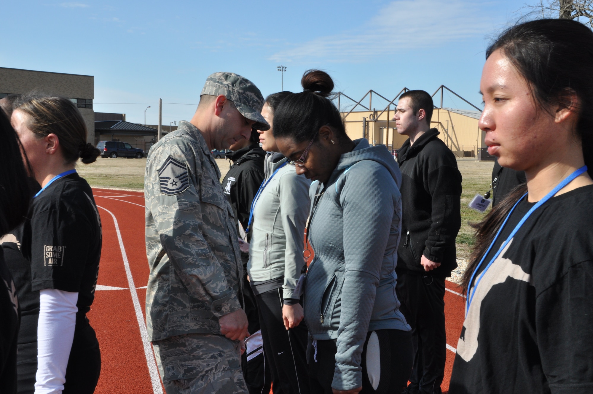 Senior Master Sgt. Pat Muoio, senior recruiter for the 459th Air Refueling Wing at Joint Base Andrews, Md., corrects trainees of the Delayed Enlistment Program during a drill and marching instruction session, February 12, 2012. The program was stood up by the 459 ARW Development and Training Flight and helps to prepare individuals whom have enlisted in the U.S. Air Force Reserve and are awaiting Basic Military Training dates. (U.S. Air Force photo/ Tech. Sgt. Steve Lewis)