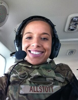 Senior Airman Victoria Hill née Allstott, 445th Communications Air Expeditionary Advisory Squadron, poses aboard an aircraft during her recent deployment to Shindand Air Base, Afghanistan, Nov. 26, 2012. Hill returned in January from a six-month deployment where she worked in knowledge operations management and the communications focal point. (Courtesy photo/Released)