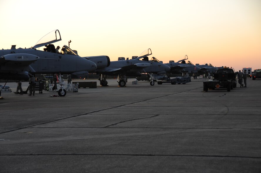 EGLIN AIR FORCE BASE, Fla. – The sun sets as members of the 442nd Fighter Wing bed down the A-10 Thunderbolt II, March 20, 2013. The 442nd Fighter Wing is deployed here for Combat Hammer a weapons system evaluation program. The A-10 Thunderbolt II Air Force Reserve unit is from Whiteman Air Force Base, Mo. (U.S. Air Force photo/Staff Sgt. Lauren Padden)