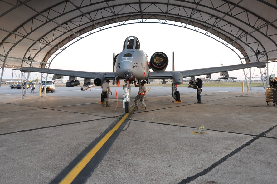 EGLIN AIR FORCE BASE, Fla. – Members of the 442nd Fighter Wing, conduct a post-load inspection of the A-10 Thunderbolt II, March 20, 2013 here. The 442nd Fighter Wing, is temporarily deployed here for Combat Hammer a weapons system evaluation program. The A-10 Thunderbolt II Air Force Reserve unit is from Whiteman Air Force Base, Mo. (U.S. Air Force photo/Staff Sgt. Lauren Padden)
