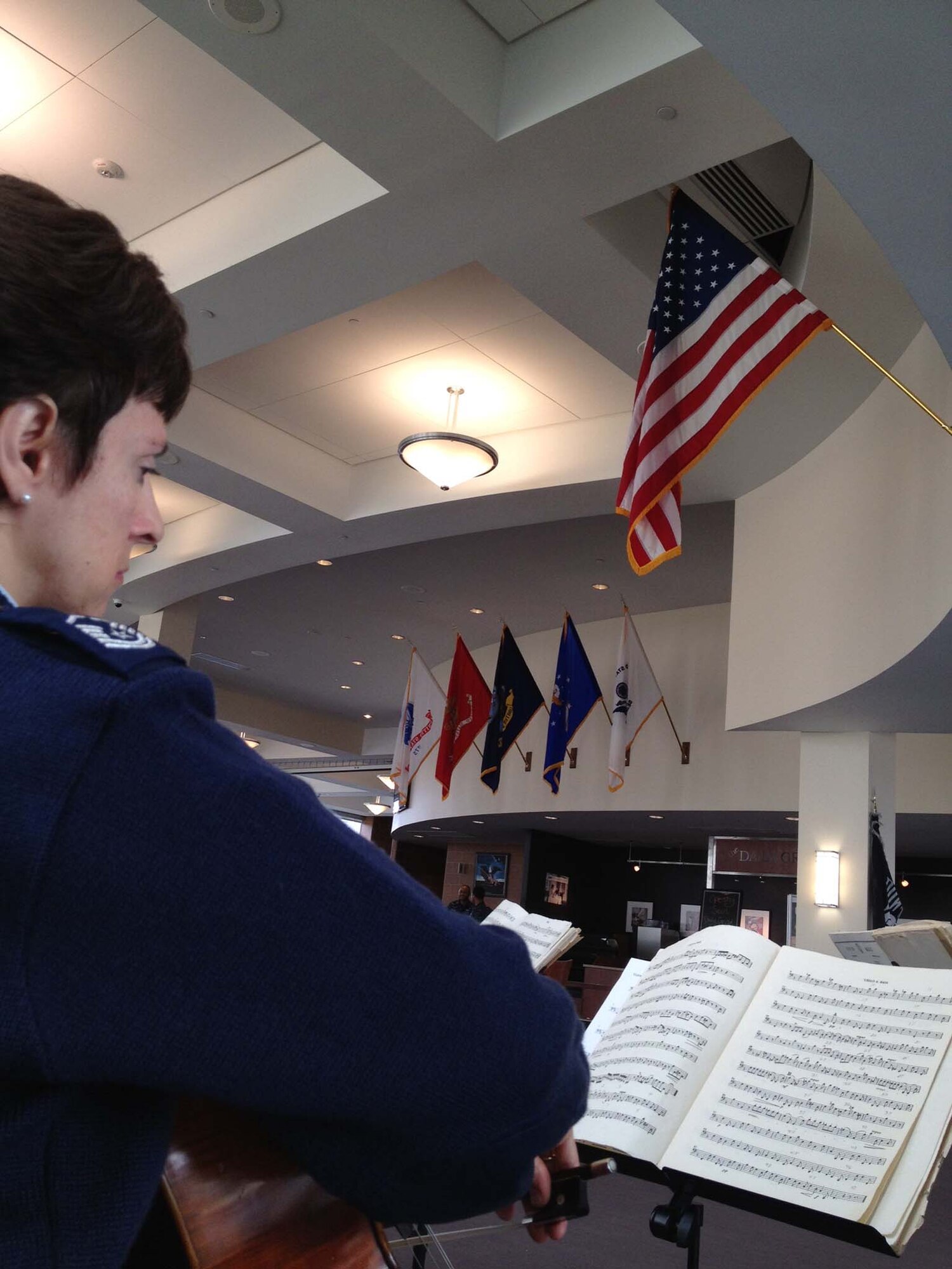 Master Sgt. Vivian Podgainy performs with a string quartet at the Wounded Warrior Café Walter Reed National Military Medical Center in Bethesda, Md. (A.F. photo by 2nd Lt. Shanti Nolan)