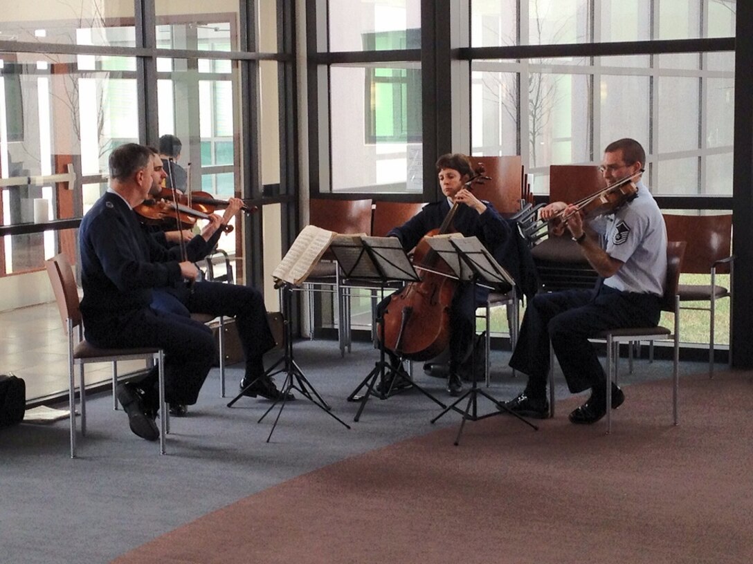 Members of the Air Force Strings perform at the Wounded Warrior Café Walter Reed National Military Medical Center in Bethesda, Md. (A.F. photo by 2nd Lt. Shanti Nolan)