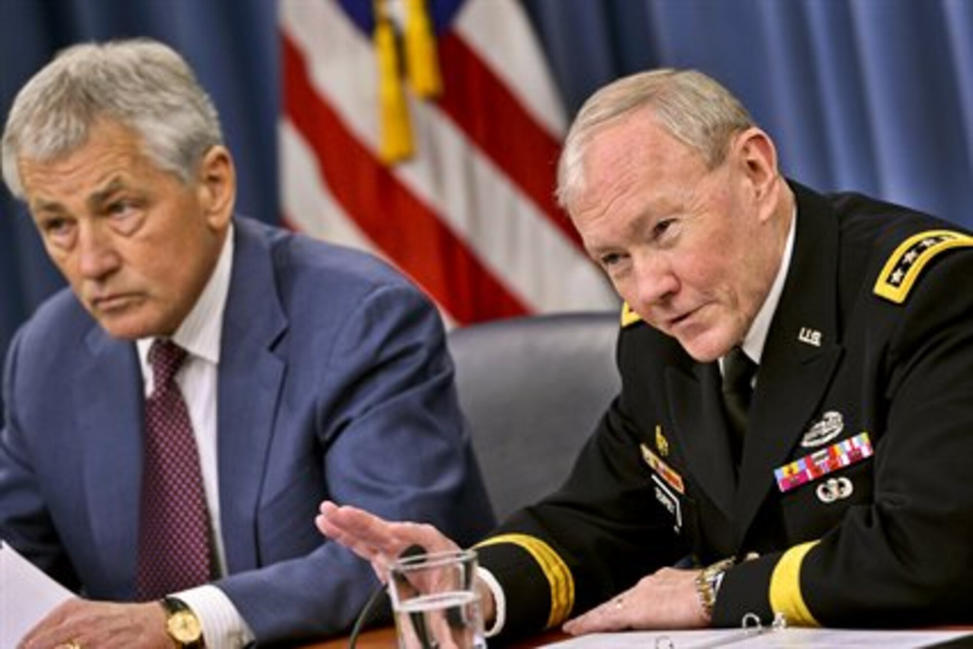 Defense Secretary Chuck Hagel announced there will be fewer furlough days during a news conference with Army Gen. Martin E. Dempsey, chairman of the Joint Chiefs of Staff, at the Pentagon, March 28, 2013. (Defense Department photo)