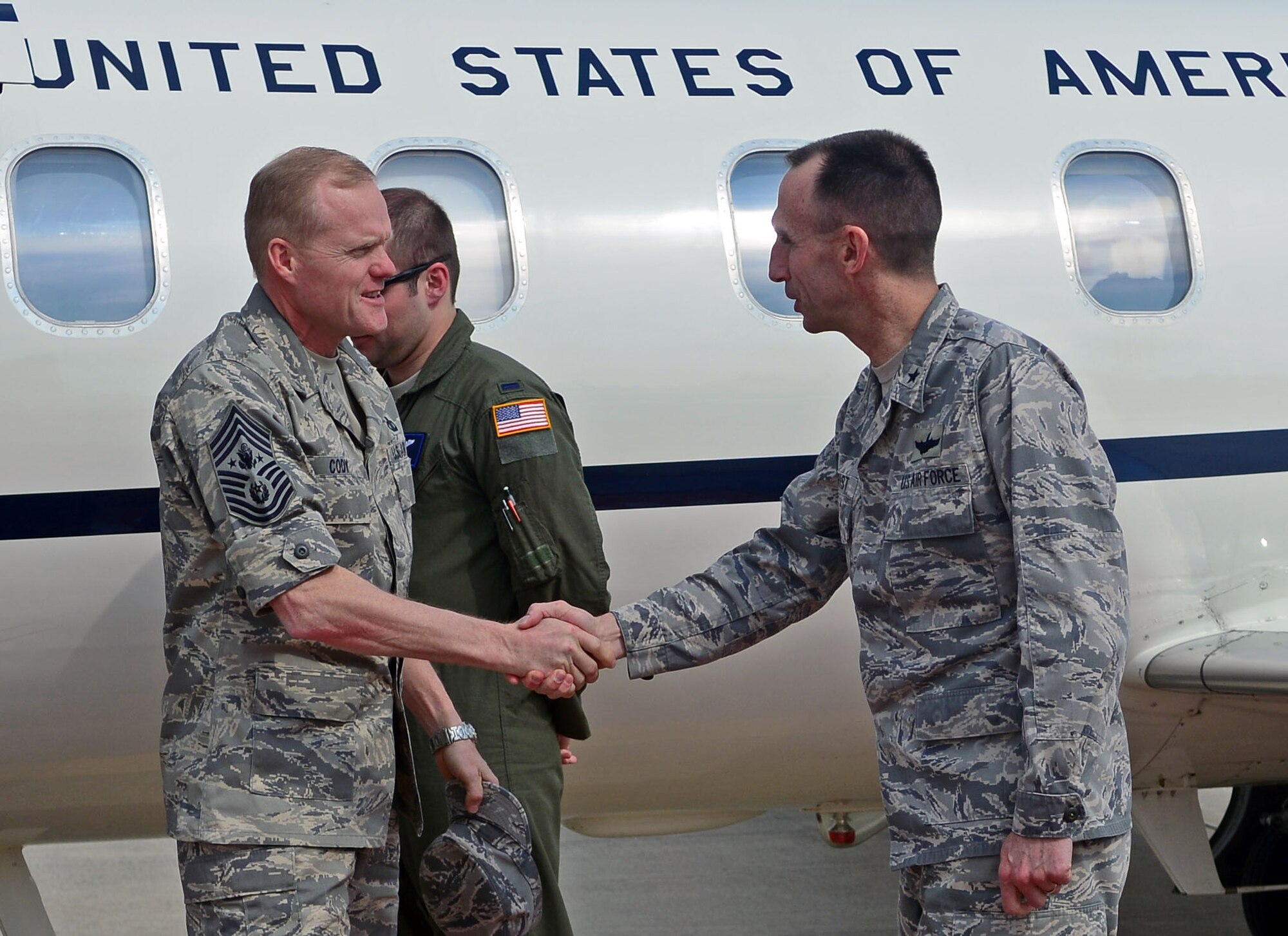 Brig. Gen. Scott Zobrist, 31st Fighter Wing commander, welcomes Chief Master Sgt. of the Air Force James Cody to Aviano Air Base, Italy, Mar. 28, 2013. Cody visited Aviano to answer any and all questions about the recent changes in the military. (U.S. Air Force photo/Airman 1st Class Matthew Lotz)