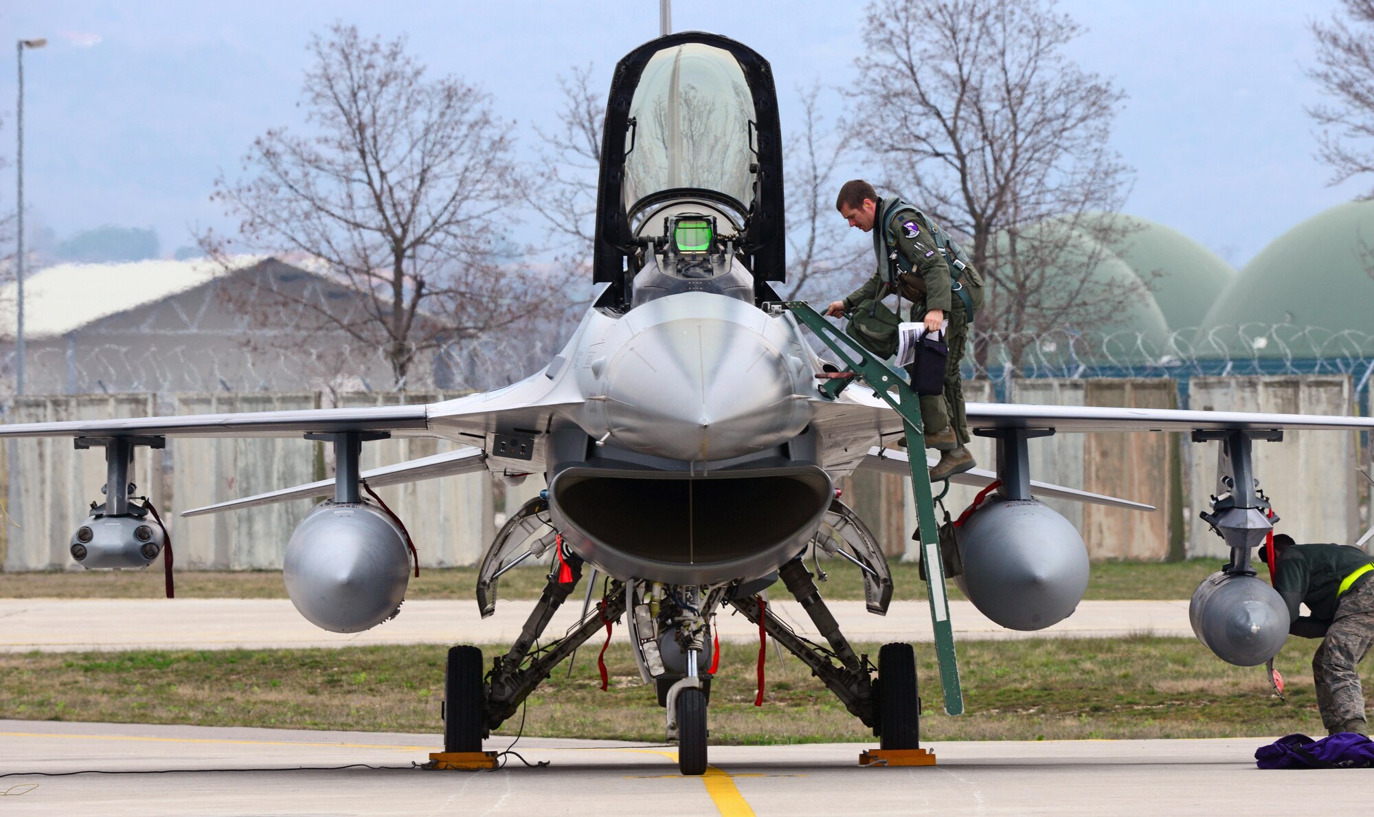 Capt. Corydon Jerch, 510th Fighter Squadron pilot, exits his aircraft after returning to Aviano Air Base, Italy after a training mission in Zaragoza Air Base, Spain, Mar. 27, 2013. The purpose of the training was to build coalition partnerships with North Atlantic Treaty Organization allies and accomplish critical flight training. (U.S. Air Force photo/Airman 1st Class Matthew Lotz)