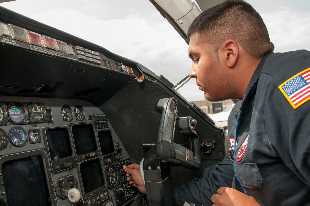 Adrian Ramirez, 47th Maintenance Directorate aircraft attendant, checks cockpit controls in a T-1A Jayhawk before a flight at Laughlin Air Force Base, Texas, March 20, 2013. During a pre-flight inspection, several different areas of an aircraft are inspected. (U.S. Air Force photo by Airman 1st Class John D. Partlow)
