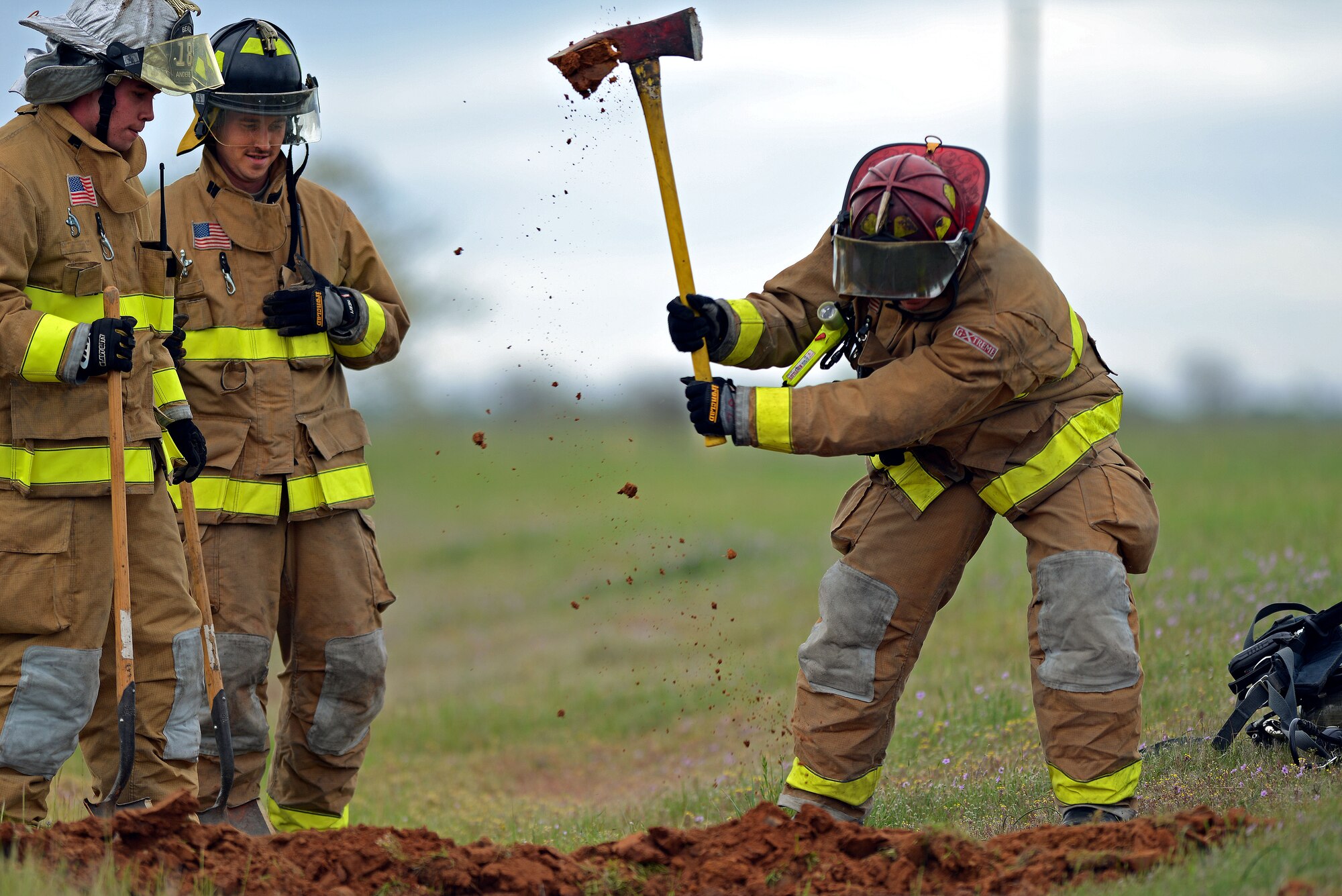 Beale firefighters coordinate response efforts to a simulated fuel spill on Beale Air Force Base, Calif., March 28, 2013. The exercise demonstrates the response of personnel throughout the base to respond to real-world situations. (U.S. Air Force photo by Airman 1st Class Drew Buchanan/Released)