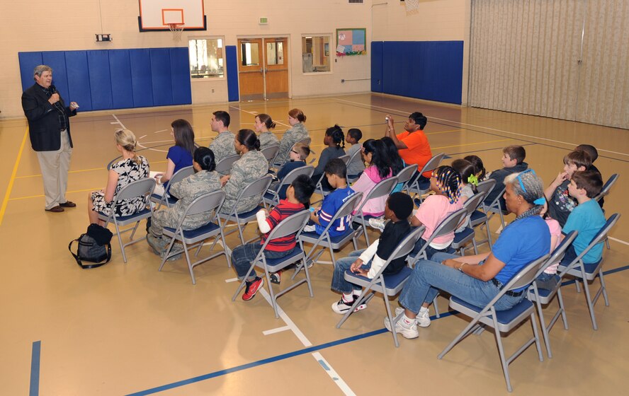 Henry Burns, Louisiana State Legislator, speaks to children at the Youth Center as part of "Month of the Military Child" on Barksdale Air Force Base, La., March 28. Burns talked about his experiences and triumphs in the military and his personal life. The Youth Center will host events every Friday in April as part of the initiative. (U.S. Air Force photo/Senior Airman Sean Martin)
