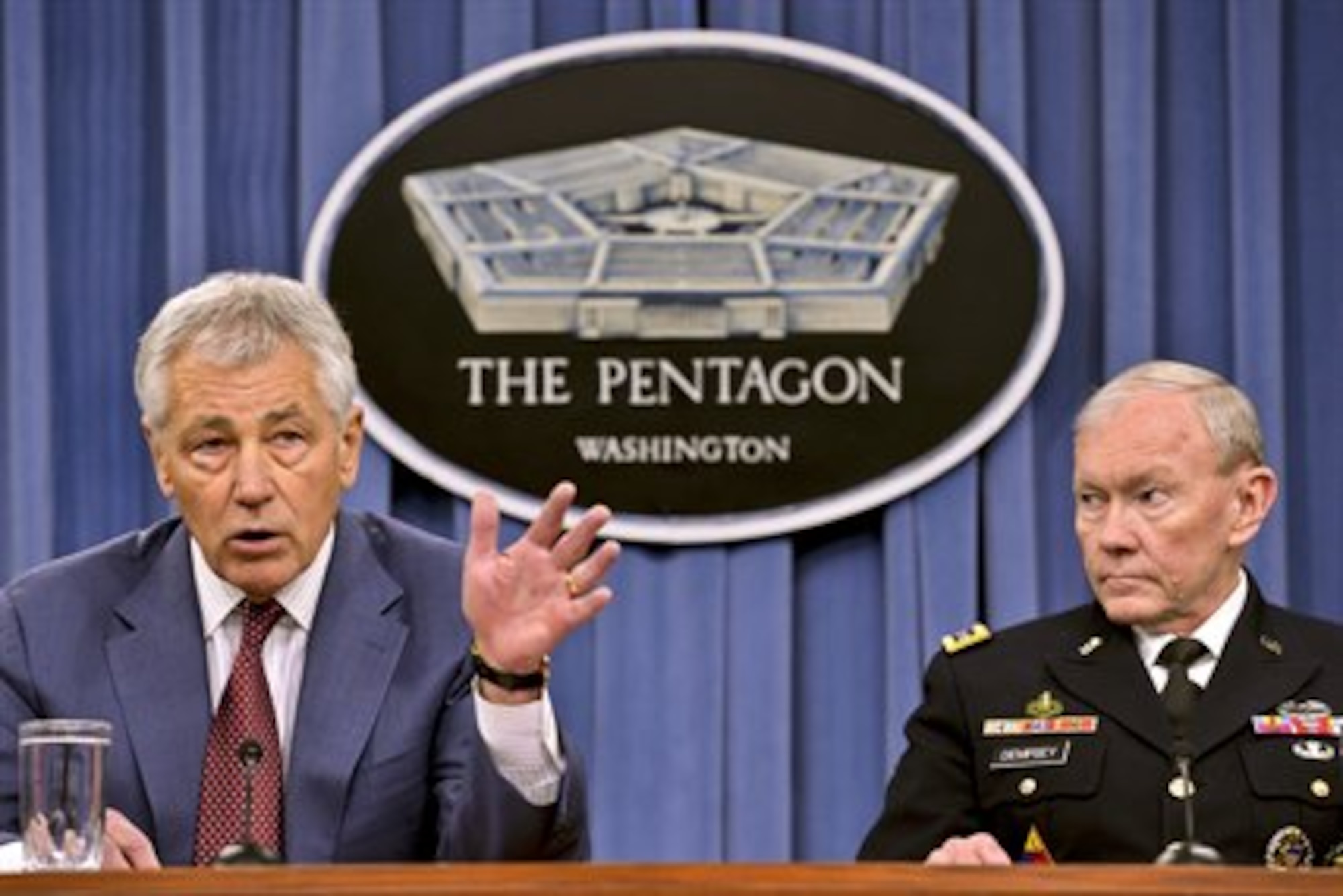 Defense Secretary Chuck Hagel and Army Gen. Martin E. Dempsey, chairman of the Joint Chiefs of Staff, brief reporters at the Pentagon, March 28, 2013. Hagel and Dempsey discussed the ongoing sequester affecting the Defense Department's budget.