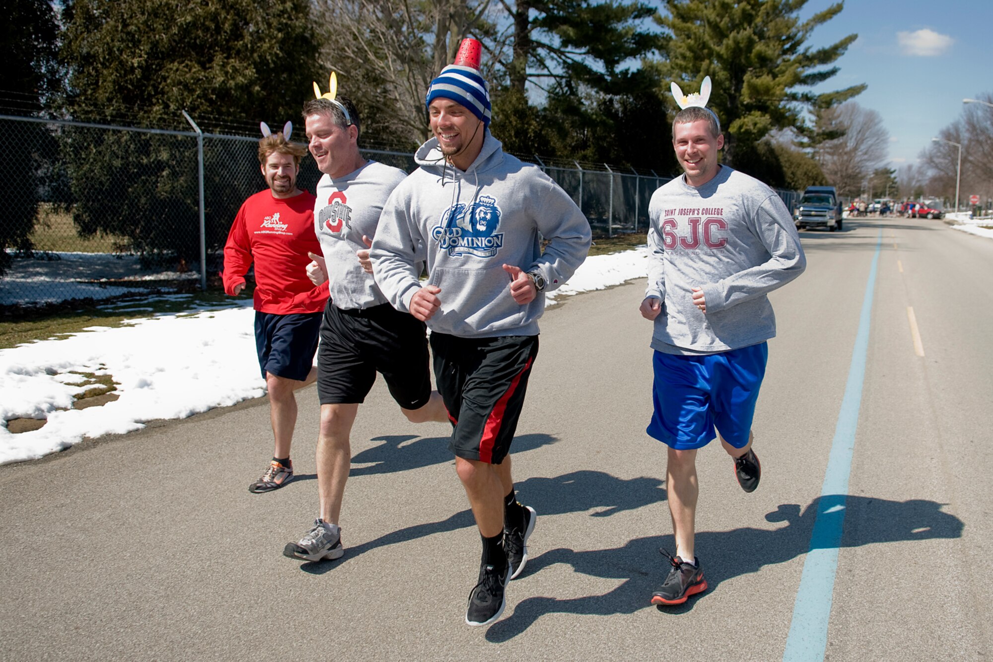 GRISSOM AIR RESERVE BASE, Ind. -- Zac Holmes, Rich Percival, Chris Wiley and Corey Walters start their trek during an Easter egg fun run held here March 28. The run was hosted by the Grissom Fitness Center and allowed for base personnel to incorporate a little seasonal fun into their fitness routine. (U.S. Air Force photo/Tech. Sgt. Mark R. W. Orders-Woempner)
