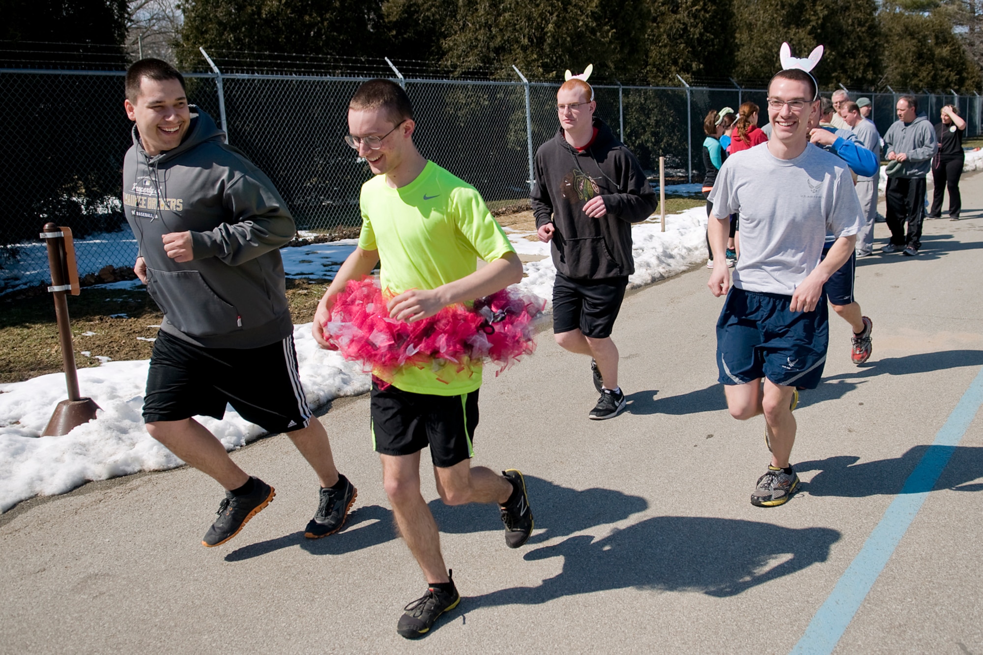 GRISSOM AIR RESERVE BASE, Ind. -- Shawn Cherty, Zachary Blow, Keith Diamond and Levi Hunter start out running during an Easter egg fun run held here March 28. The run was hosted by the Grissom Fitness Center and allowed for base personnel to incorporate a little seasonal fun into their fitness routine. (U.S. Air Force photo/Tech. Sgt. Mark R. W. Orders-Woempner)
