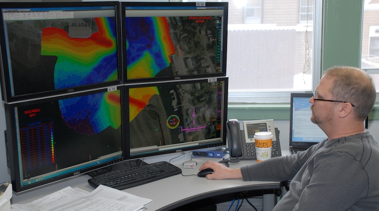 Gene Hubbell, engineering technician in the Geomatics Section, examines a project condition survey of Craig Harbor in AutoCAD Civil 3D. The Alaska District won best project in the “Innovative Use of Civil 3D” category Jan. 11 in the 2012 U.S. Army Corps of Engineers BIM Awards.