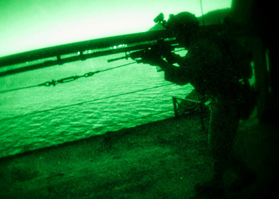 26th Marine Expeditionary Unit (MEU) Maritime Raid Force Marines engage hostile targets while conducting nighttime vessel clearing exercises aboard the HS Aris at the NATO Maritime Interdiction Operational Training Centre in Souda Bay, Crete, Greece, March 28, 2013. The 26th MEU is deployed to the 6th Fleet area of operations. The 26th MEU operates continuously across the globe, providing the president and unified combatant commanders with a forward-deployed, sea-based quick reaction force. The MEU is a Marine Air-Ground Task Force capable of conducting amphibious operations, crisis response and limited contingency operations. (U.S. Marine Corps photo by Cpl. Christopher Q. Stone/Released)