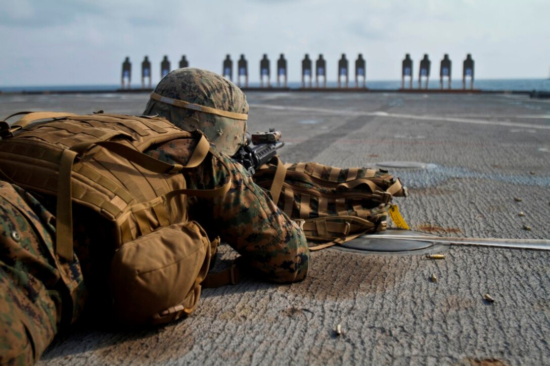 A Marine with Company B., Battalion Landing Team 1st Battalion, 5th Marines, 31st Marine Expeditionary Unit, fires an M-16A4 service rifle from the prone position during a live-fire shoot here, March 30. The company honed their marksmanship skills while en route to the annual bilateral exercise Balikatan, where elements of the 31st MEU are scheduled to train alongside their counterparts in the Republic of the Philippines. The 31st MEU is the only continuously forward-deployed MEU and is the Marine Corps' force in readiness in the Asia-Pacific region.