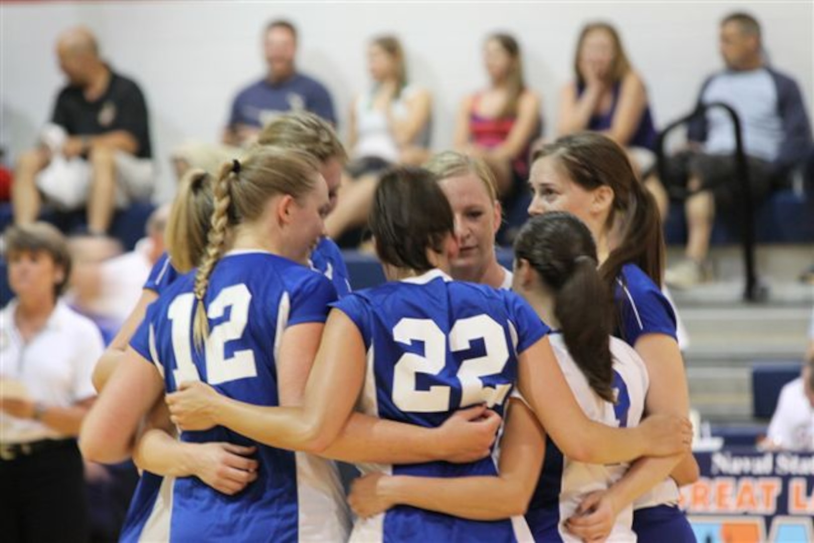 Members of the 2012 All-Air Force Womens Volleyball team huddle up before match play.