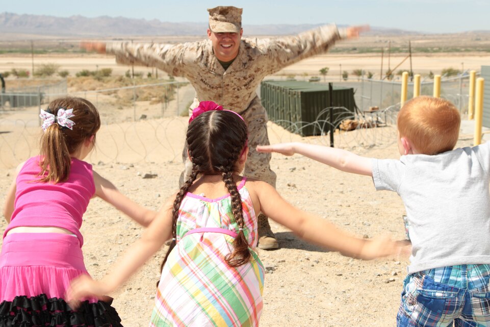 ance Cpl. Ricky Madera, intelligence clerk, 3rd Combat Engineer Battalion, plays “Lance Corporal Says” with kids of currently deployed unit members Saturday as part of 3rd CEB’s deployment workshop. 