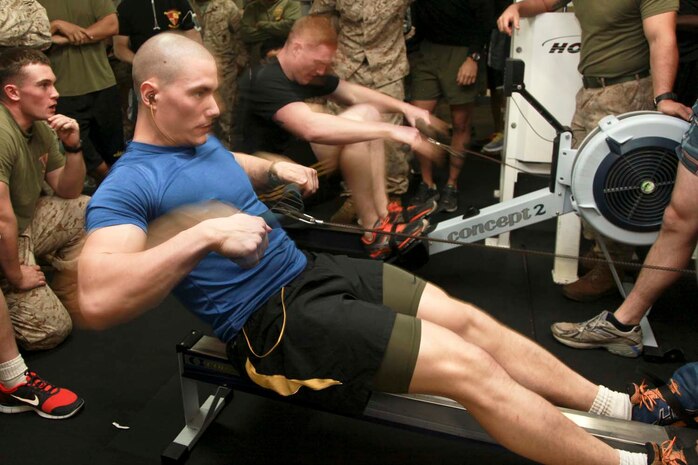 USS PELELIU (April 28, 2013) Lance Cpl. John-Paul Hethcock, rifleman, Security Platoon, Maritime Raid Force, 15th Marine Expeditionary Unit, rows during the Campbell Cup held in the gym of USS Peleliu, April 28. The challenge was the final competition of the Campbell Cup, a competition that brought teams from within the 15th Marine Expeditionary Unit and Peleliu Amphibious Ready Group against each other. This two-night event pitted the Command Element’s team against Kilo Company’s team in a showdown for the coveted Campbell Cup.  The 15th MEU is deployed as part of the Peleliu Amphibious Ready Group and is comprised of approximately 2,400 Marines and sailors. Together with Amphibious Squadron Three, they provide a forward-deployed, flexible sea-based Marine Air Ground Task Force capable of conducting a wide variety of operations ranging from humanitarian aid to combat. Hethcock, 20, is from Virginia Beach, Va. (U.S. Marine Corps photo by Cpl. John Robbart III/Released)