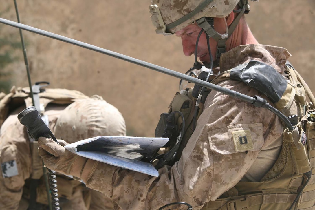 U.S. Marine Capt. Benjamin M. Middendorf, the former commander of Golf Company, 2nd Battalion, 5th Marine Regiment, pauses a patrol to check their position during helicopter-borne operations here, May 27, 2012. Middendorf, a native of Rochester, Minn., was selected by Gen. James F. Amos, the commandant of the Marine Corps, to receive the 2012 Lt. Col. William G. Leftwich Jr. Trophy for Outstanding Leadership. Leftwich, a Navy Cross recipient, died in 1970 when his helicopter crashed in Vietnam, where he was commanding the Marines and sailors of 1st Reconnaissance Bn. Middendorf is currently the commander of Headquarters and Service Co., 5th Marines.